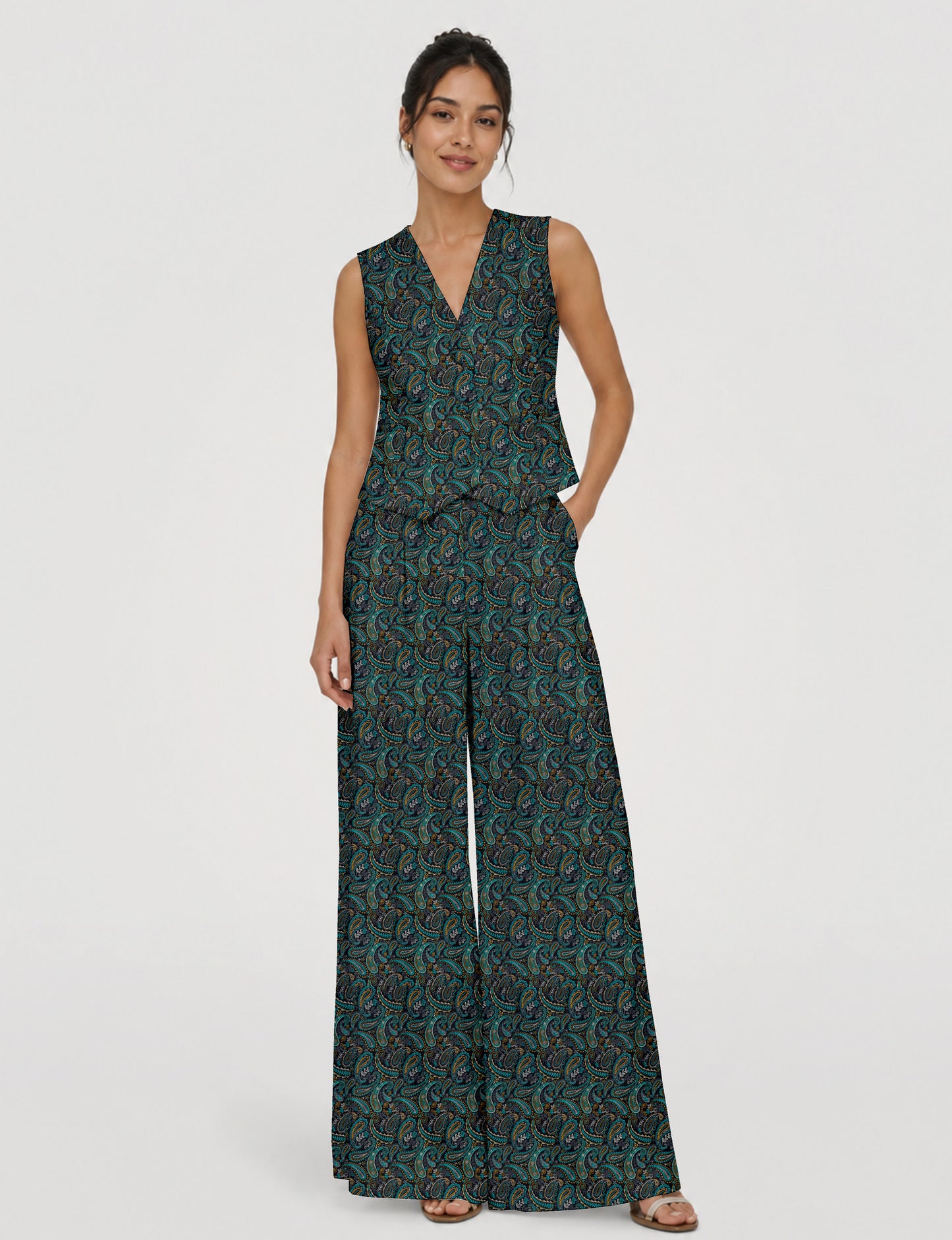 Women's tailored waistcoat set with a sleeveless V-neck button-front waistcoat and high-rise wide leg trousers in a coordinated matching outfit.