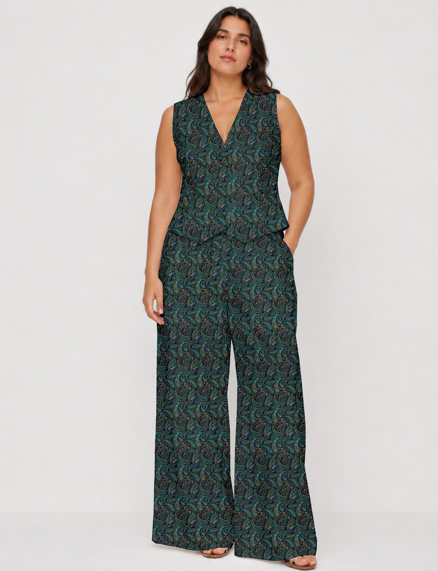 Women's tailored waistcoat set with a sleeveless V-neck button-front waistcoat and high-rise wide leg trousers in a coordinated matching outfit.