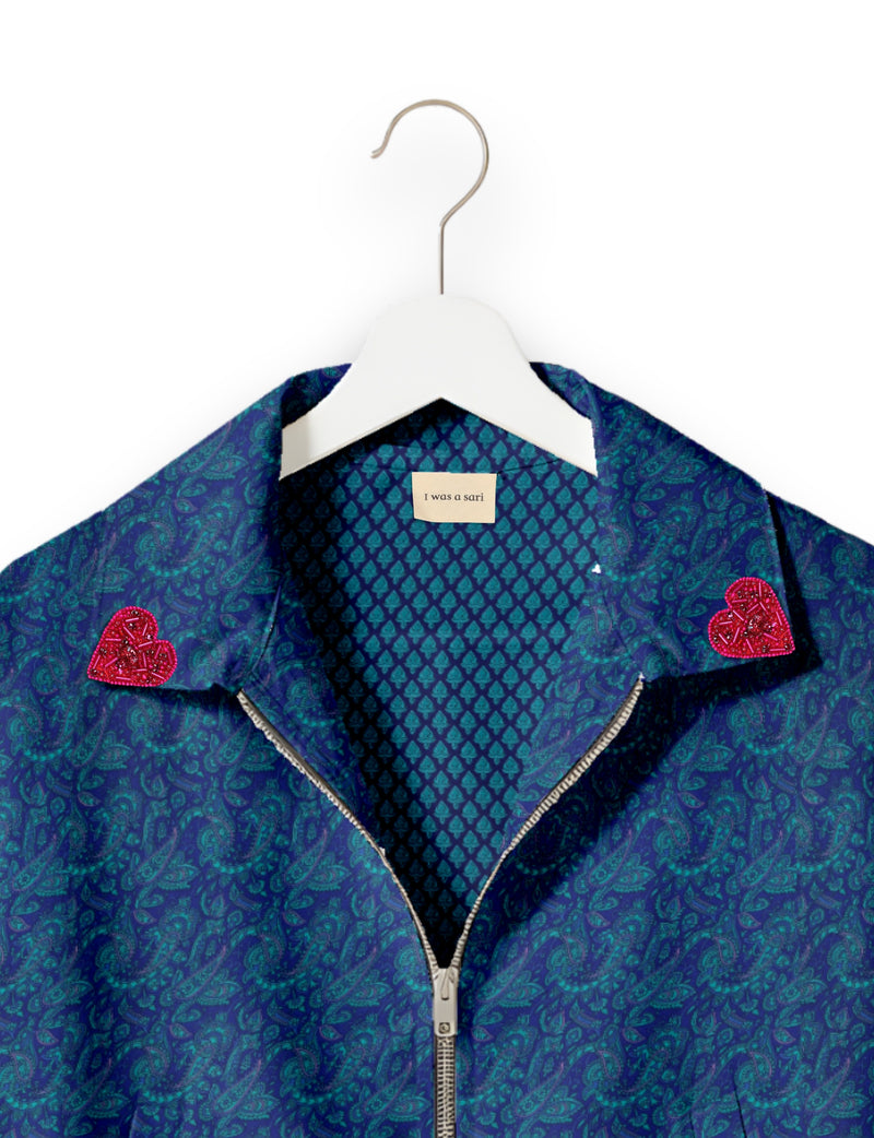 Love Bomber Jacket made from recycled fabric, featuring hand-stitched Aari embroidery. A unique piece of zero-waste clothing, part of the circular fashion movement. Designed with upcycled materials for a stylish yet environmentally friendly clothing choice.
