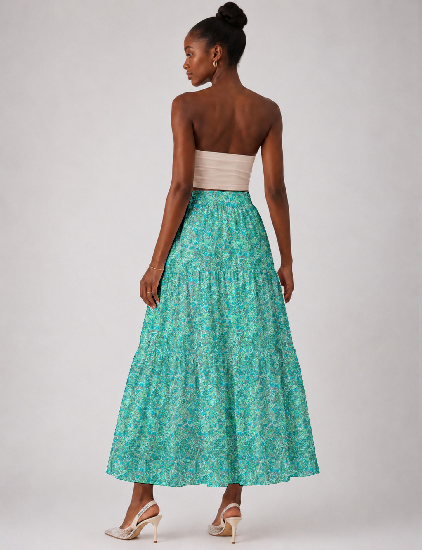 Yellow midi tiered skirt with small dark geometric micro pattern, flat lay front view