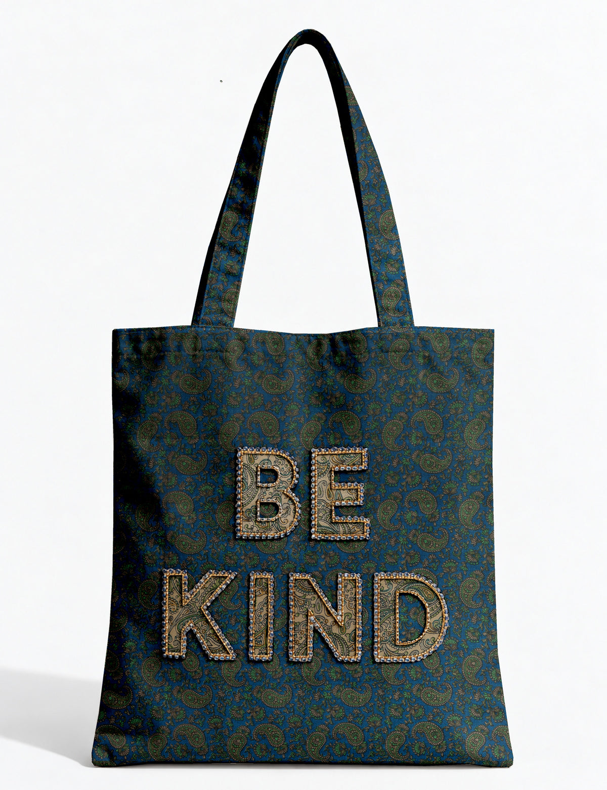 Be Kind tote bag with contrast sari fabric appliqué lettering, double shoulder straps, and front slip pocket.