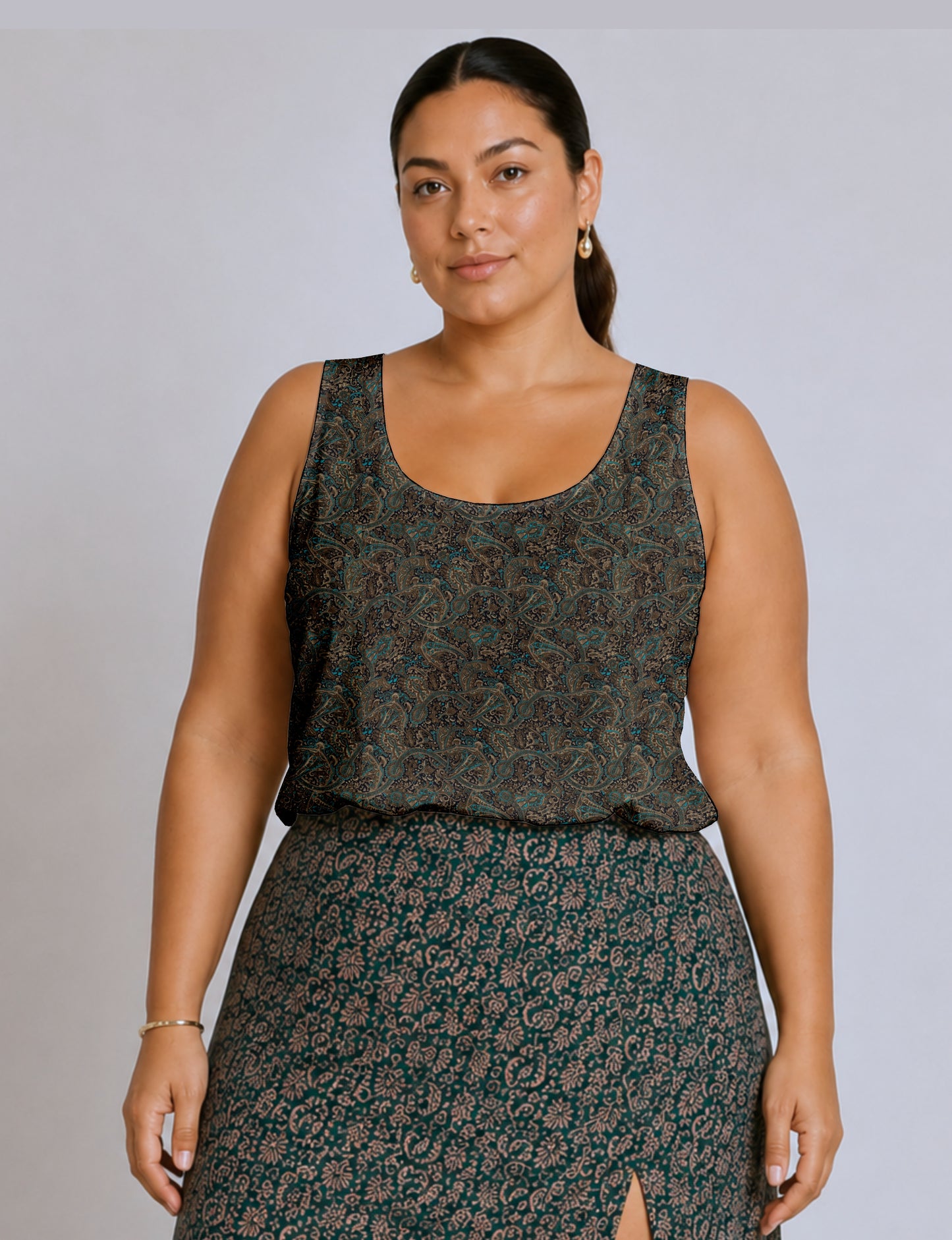 Women's sleeveless blouse with a relaxed straight fit, wide scoop neckline, deep scoop back, and hip-length silhouette.