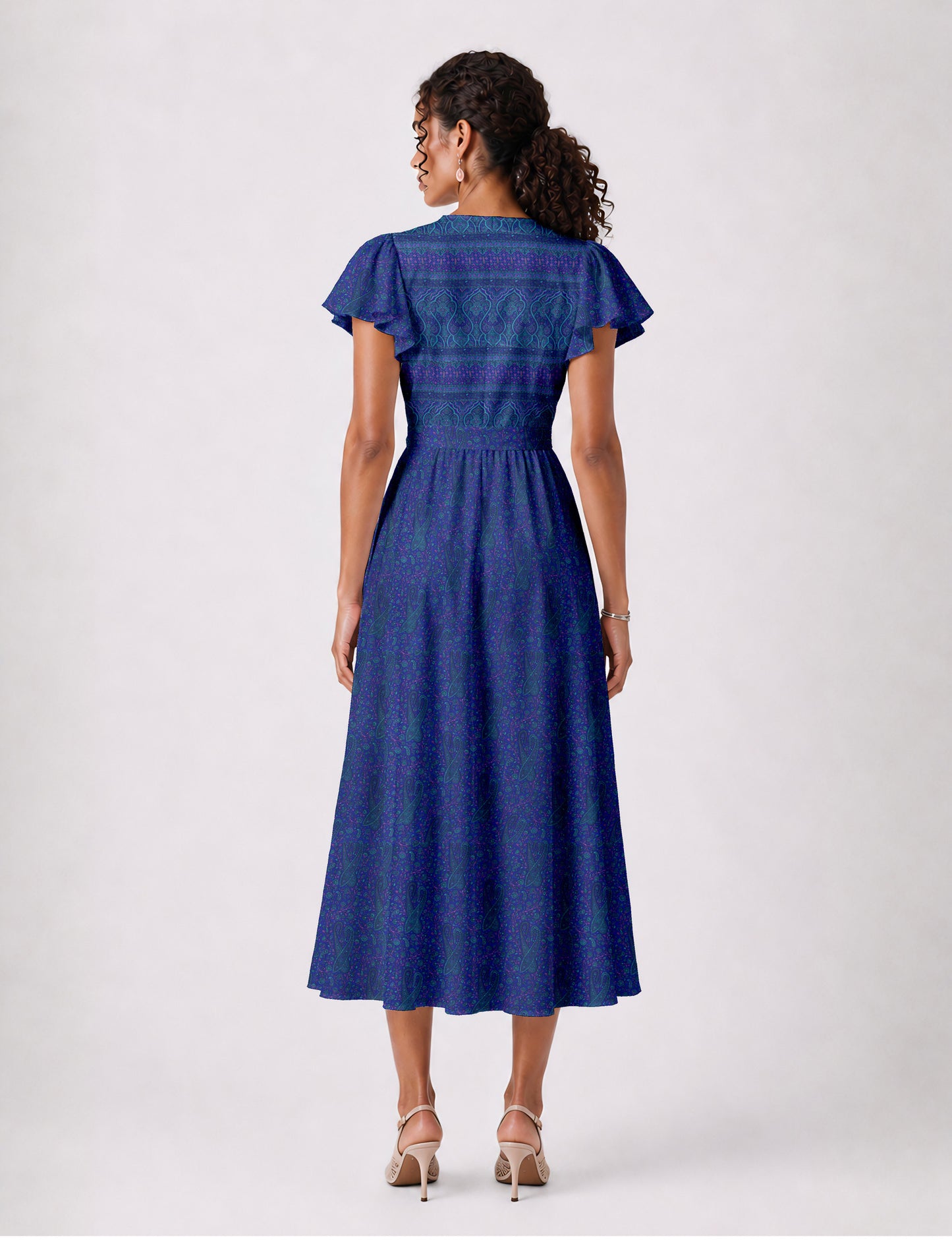 Elegant midi wrap dress with a V-neckline, adjustable waist tie, fitted bodice, and flared skirt for a timeless, flattering silhouette.