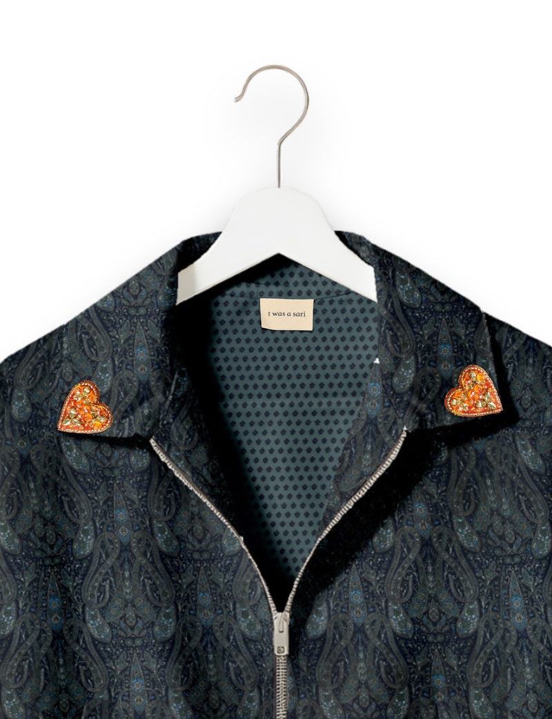 Love Bomber Jacket made from recycled fabric, featuring hand-stitched Aari embroidery. A unique piece of zero-waste clothing, part of the circular fashion movement. Designed with upcycled materials for a stylish yet environmentally friendly clothing choice.
