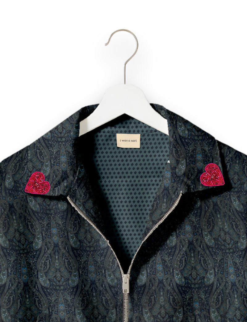 Love Bomber Jacket made from recycled fabric, featuring hand-stitched Aari embroidery. A unique piece of zero-waste clothing, part of the circular fashion movement. Designed with upcycled materials for a stylish yet environmentally friendly clothing choice.