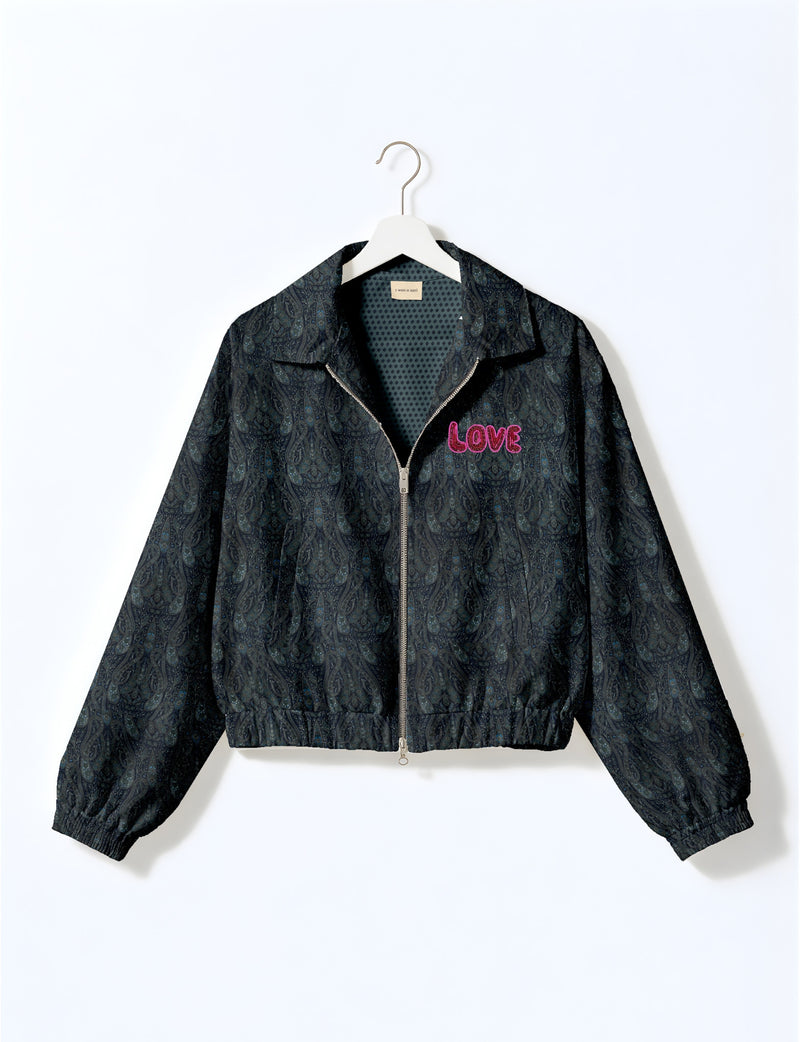 Love Bomber Jacket made from recycled fabric, featuring hand-stitched Aari embroidery. A unique piece of zero-waste clothing, part of the circular fashion movement. Designed with upcycled materials for a stylish yet environmentally friendly clothing choice.