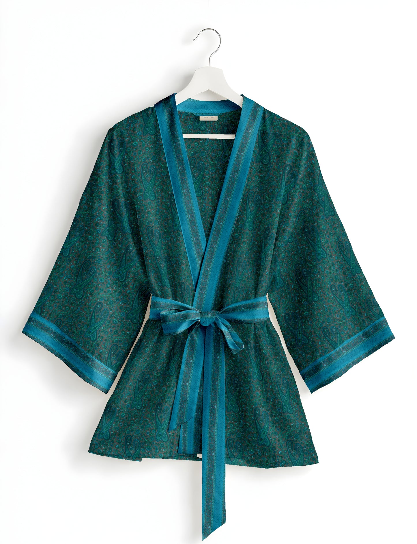 Short kimono robe with wrap front, V-neckline, wide sleeves, waist tie, and concealed skort detail.