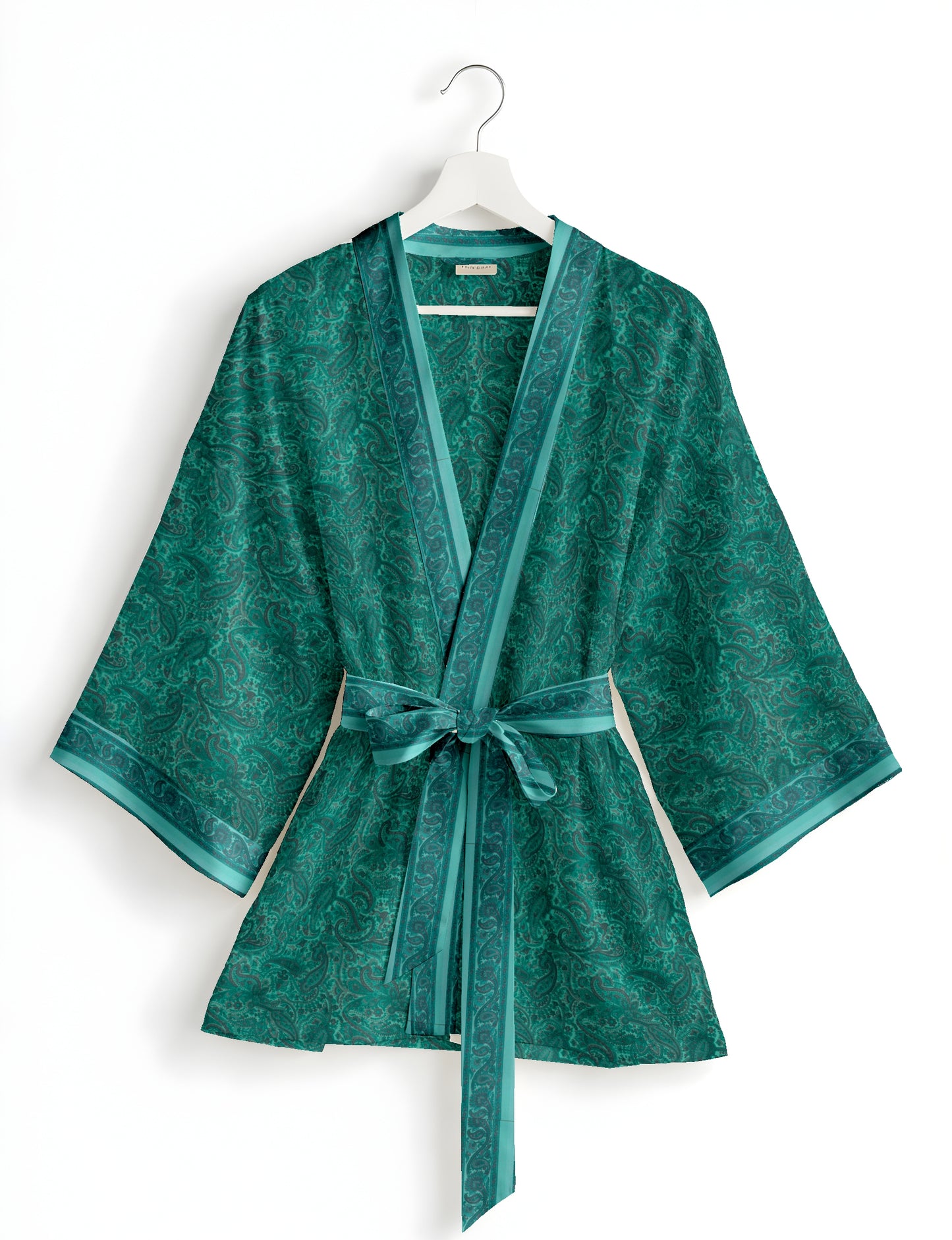 Short kimono robe with wrap front, V-neckline, wide sleeves, waist tie, and concealed skort detail.