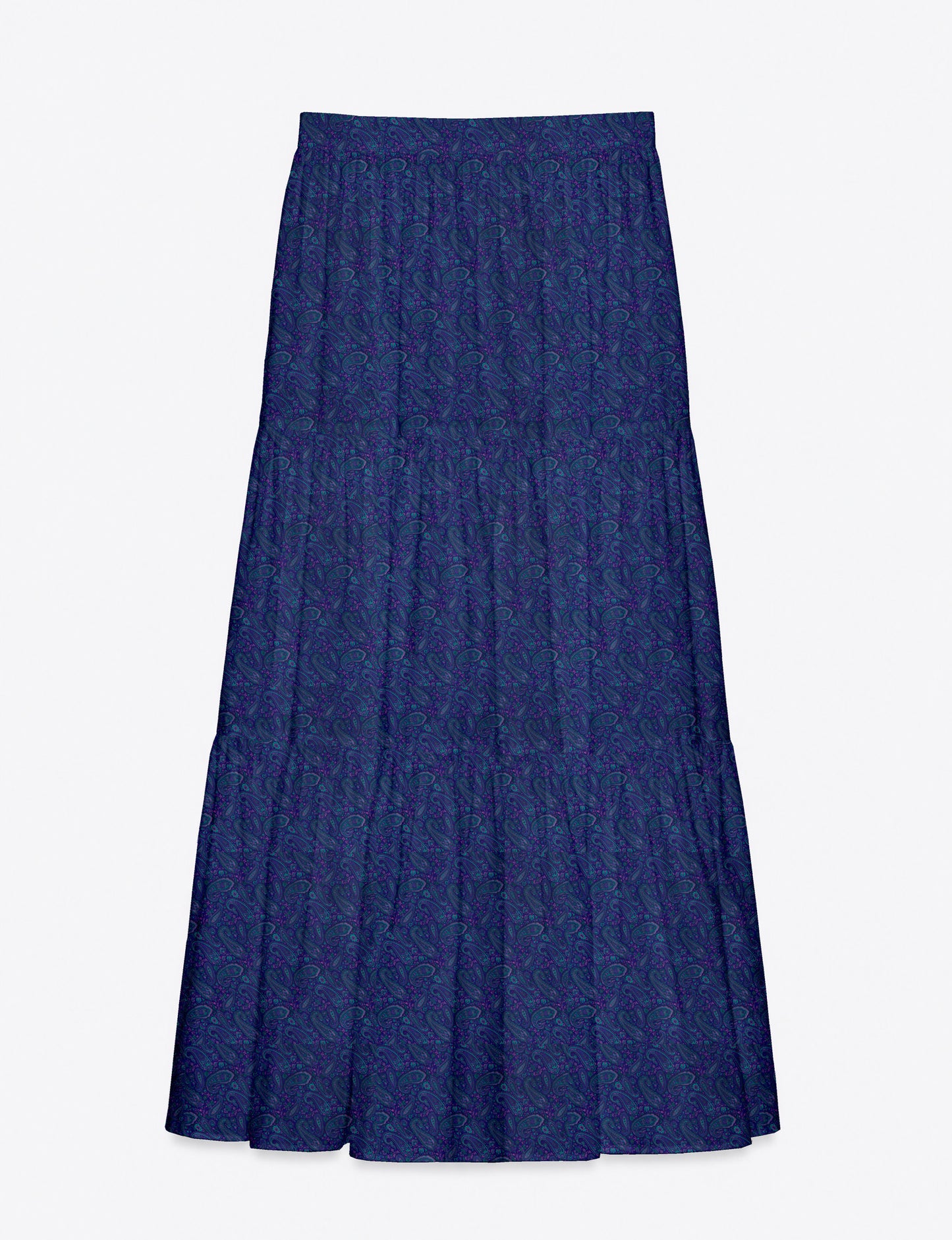 Woman wearing a yellow midi tiered skirt with a small geometric pattern, shown from the back, paired with beige top and