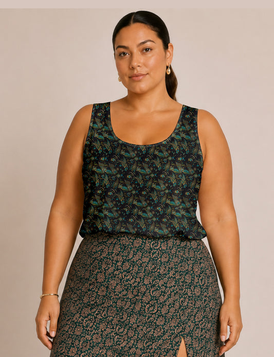 Women's sleeveless blouse with a relaxed straight fit, wide scoop neckline, deep scoop back, and hip-length silhouette.