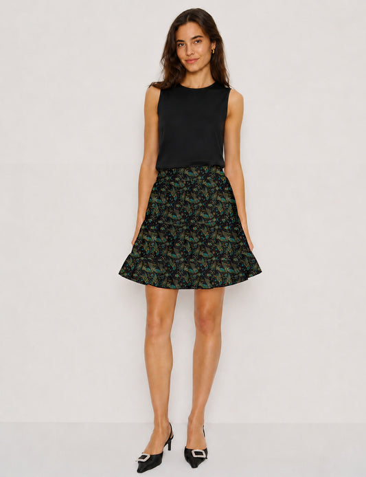 Short tiered skirt with a fitted waistband, knife pleats, softly flared silhouette, side seam pockets, and above-the-knee length.