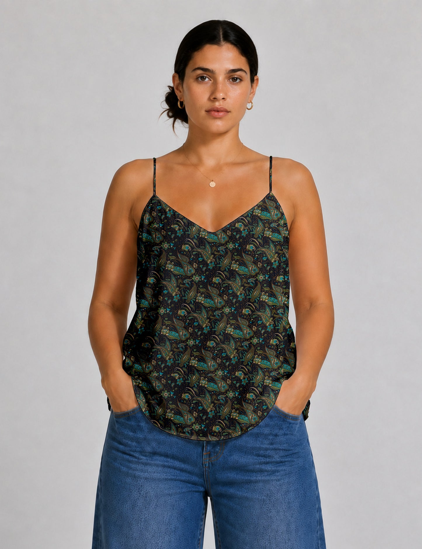 Women's sleeveless slip top with a relaxed straight fit, soft V-neckline, deep V-back, and delicate spaghetti straps.