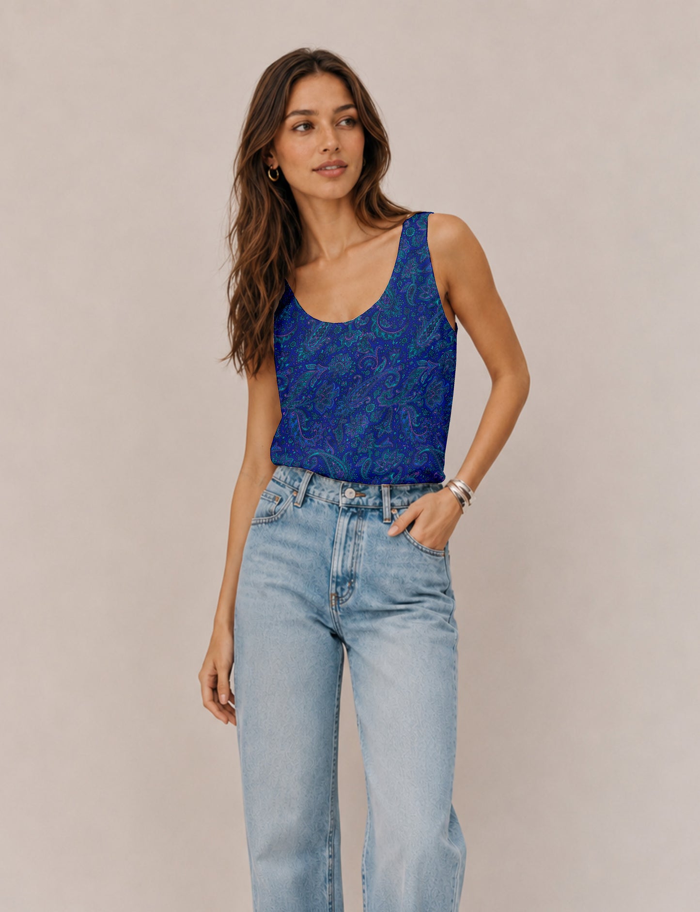 Women's sleeveless blouse with a relaxed straight fit, wide scoop neckline, deep scoop back, and hip-length silhouette.