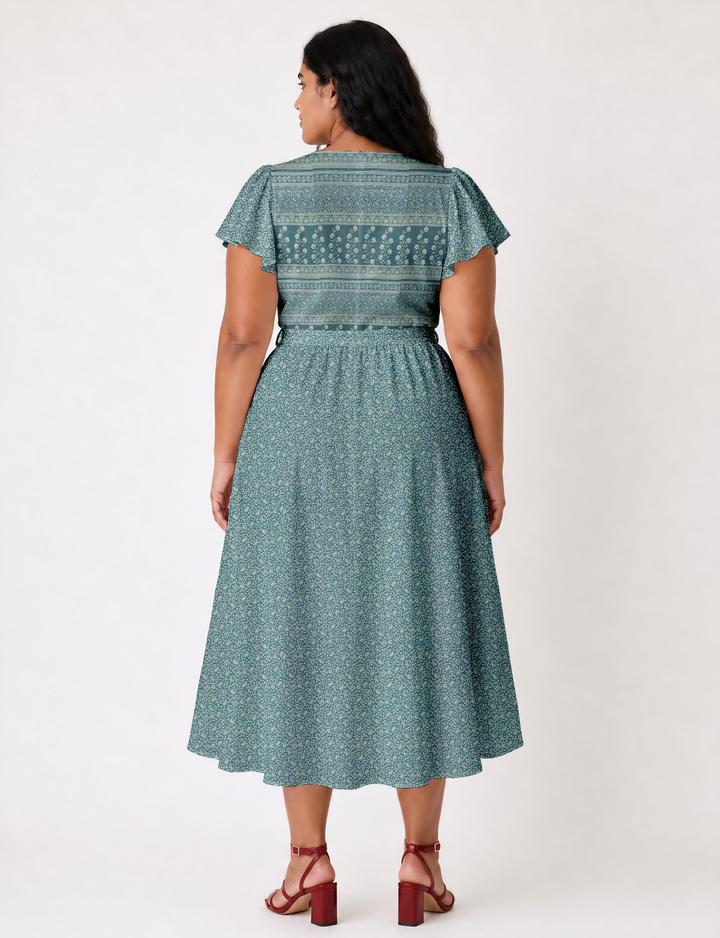 Elegant midi wrap dress with a V-neckline, adjustable waist tie, fitted bodice, and flared skirt for a timeless, flattering silhouette.