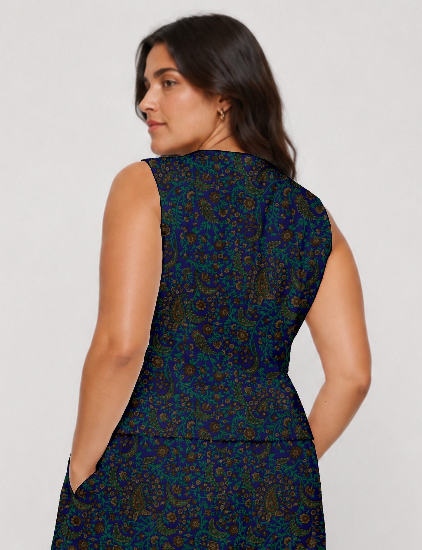 Women's fitted waistcoat with V-neck, single-breasted button closure, tailored silhouette, and pointed hem in sustainable fashion.