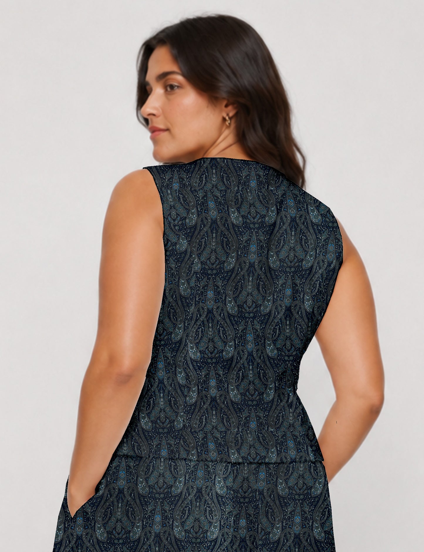 Women's fitted waistcoat with V-neck, single-breasted button closure, tailored silhouette, and pointed hem in sustainable fashion.