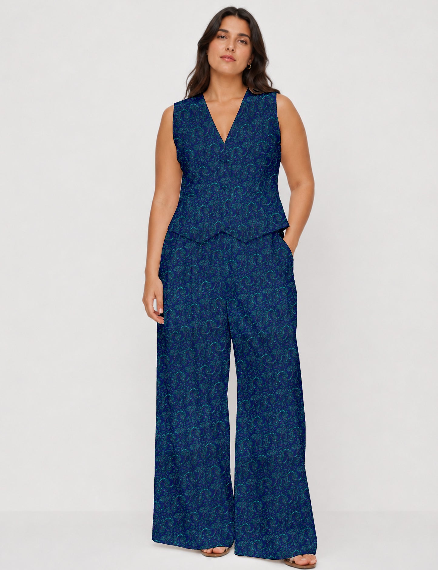 Women's tailored waistcoat set with a sleeveless V-neck button-front waistcoat and high-rise wide leg trousers in a coordinated matching outfit.