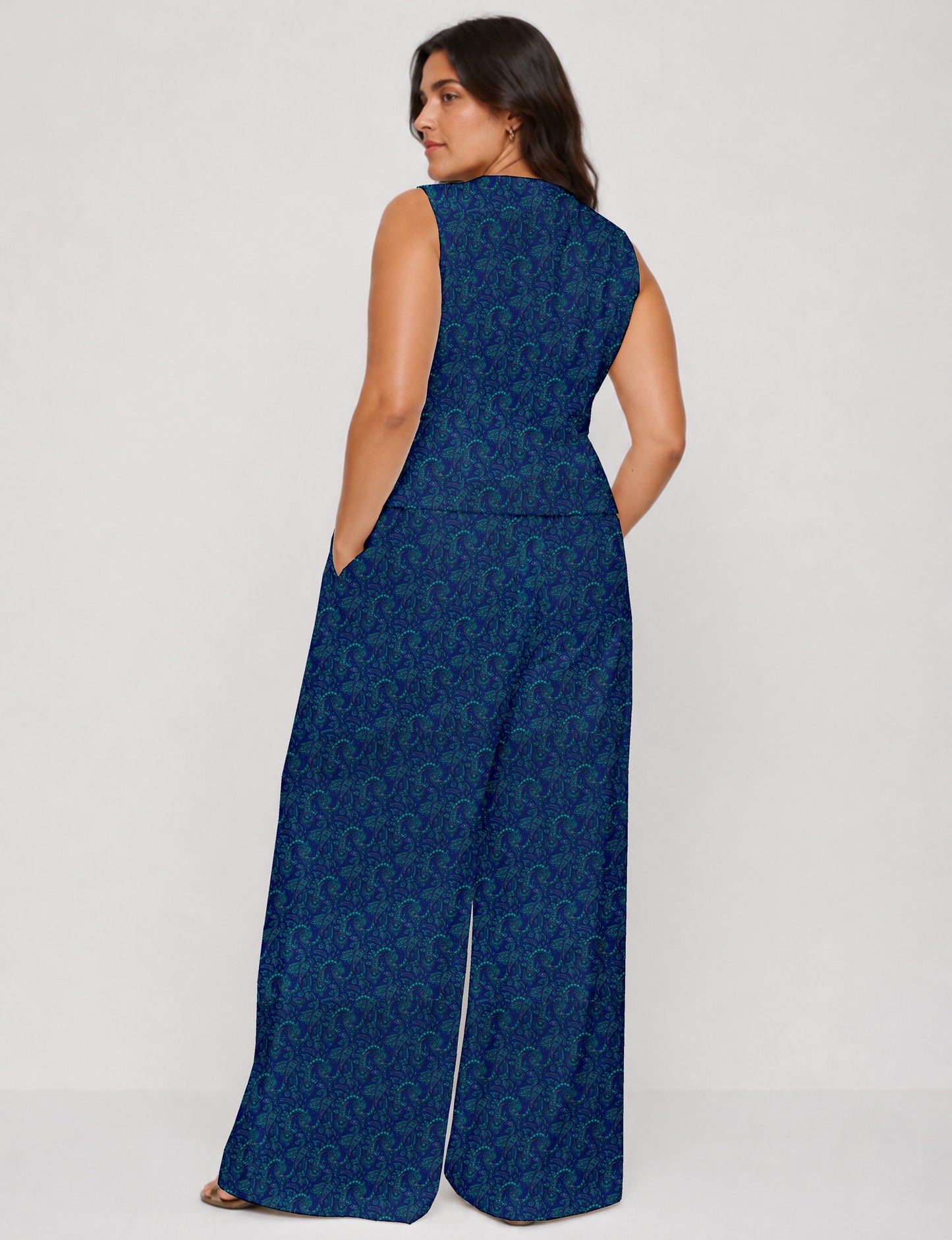 Women's tailored waistcoat set with a sleeveless V-neck button-front waistcoat and high-rise wide leg trousers in a coordinated matching outfit.