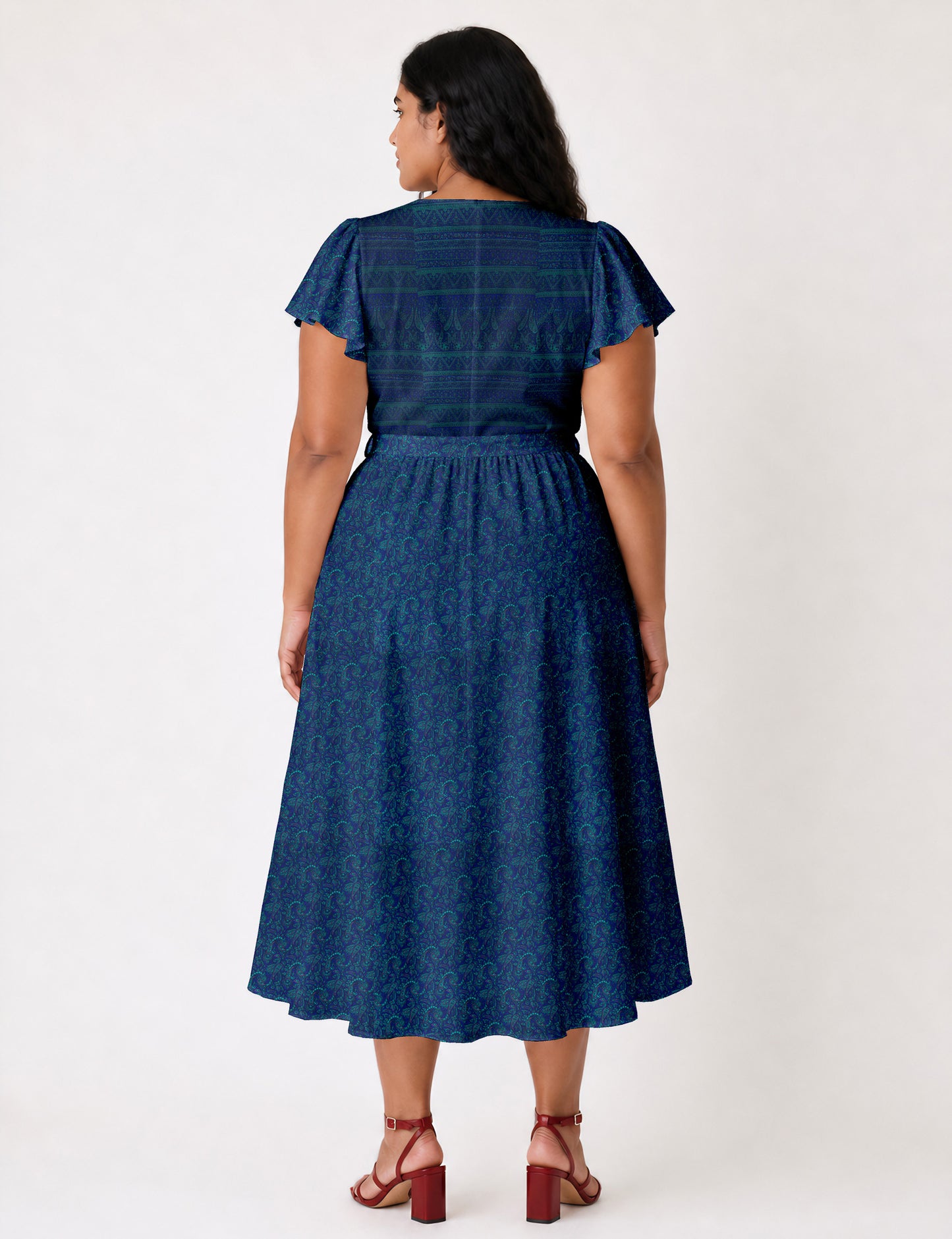 Elegant midi wrap dress with a V-neckline, adjustable waist tie, fitted bodice, and flared skirt for a timeless, flattering silhouette.