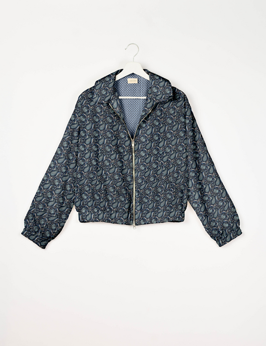 Upcycled Bomber Jacket made from recycled sari materials, featuring a cute cropped shape, elasticated hem and cuffs, and contrast sari print lining. Sustainable apparel promoting eco-friendly fashion and ethical clothing.