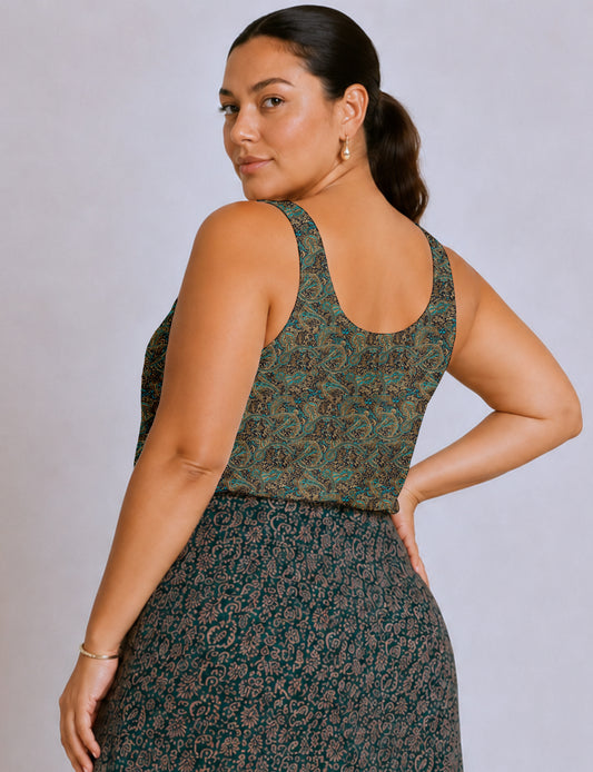 Women's sleeveless blouse with a relaxed straight fit, wide scoop neckline, deep scoop back, and hip-length silhouette.