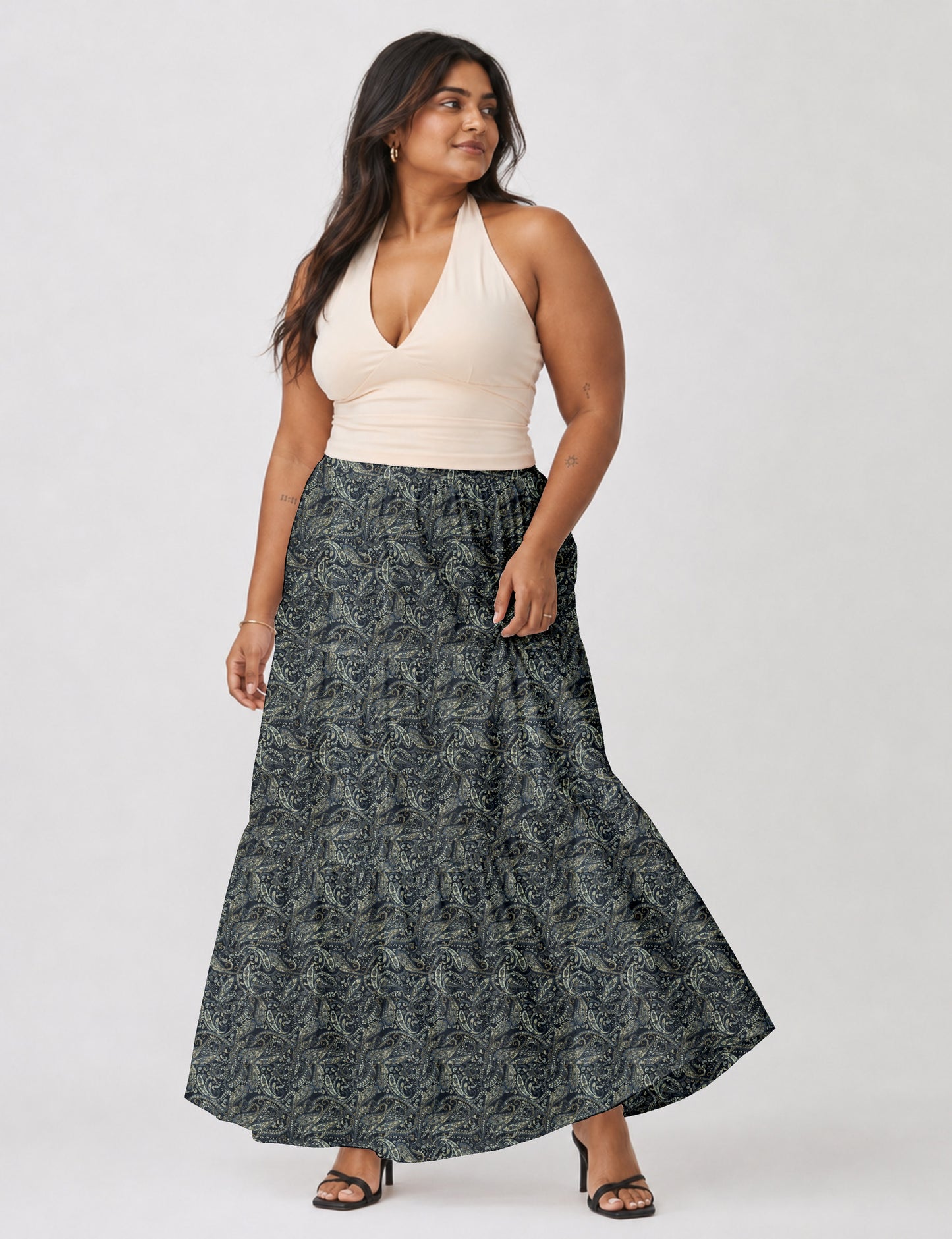 Yellow midi tiered skirt with small dark geometric micro pattern, flat lay front view