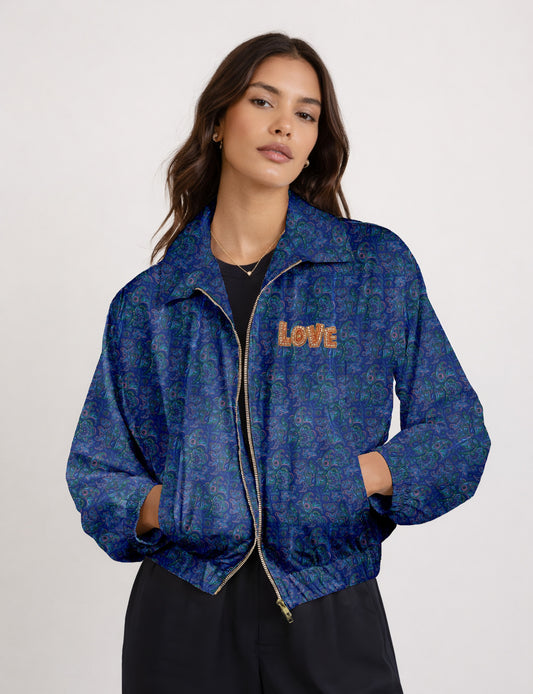 Love Bomber Jacket made from recycled fabric, featuring hand-stitched Aari embroidery. A unique piece of zero-waste clothing, part of the circular fashion movement. Designed with upcycled materials for a stylish yet environmentally friendly clothing choice.