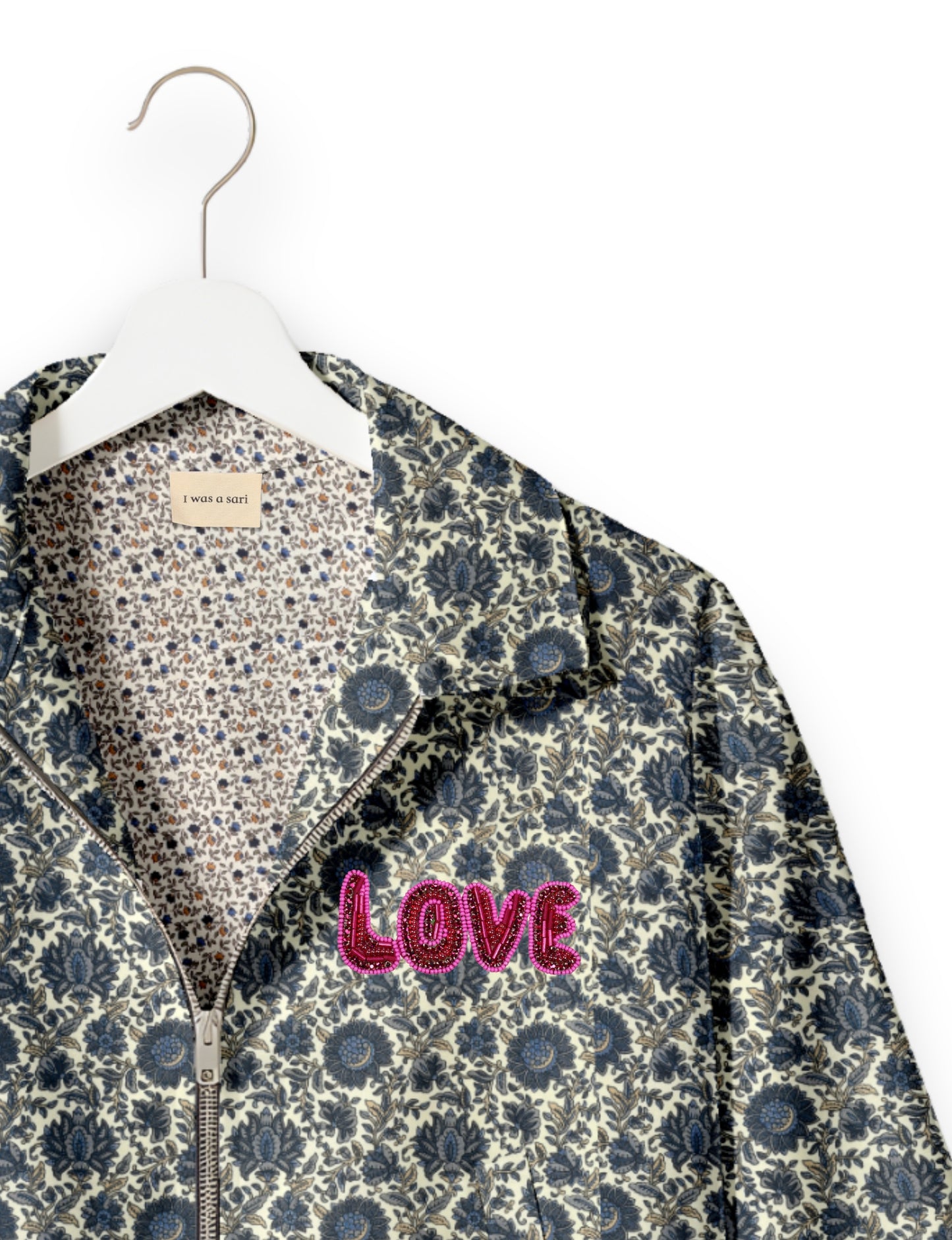 Love Bomber Jacket made from recycled fabric, featuring hand-stitched Aari embroidery. A unique piece of zero-waste clothing, part of the circular fashion movement. Designed with upcycled materials for a stylish yet environmentally friendly clothing choice.