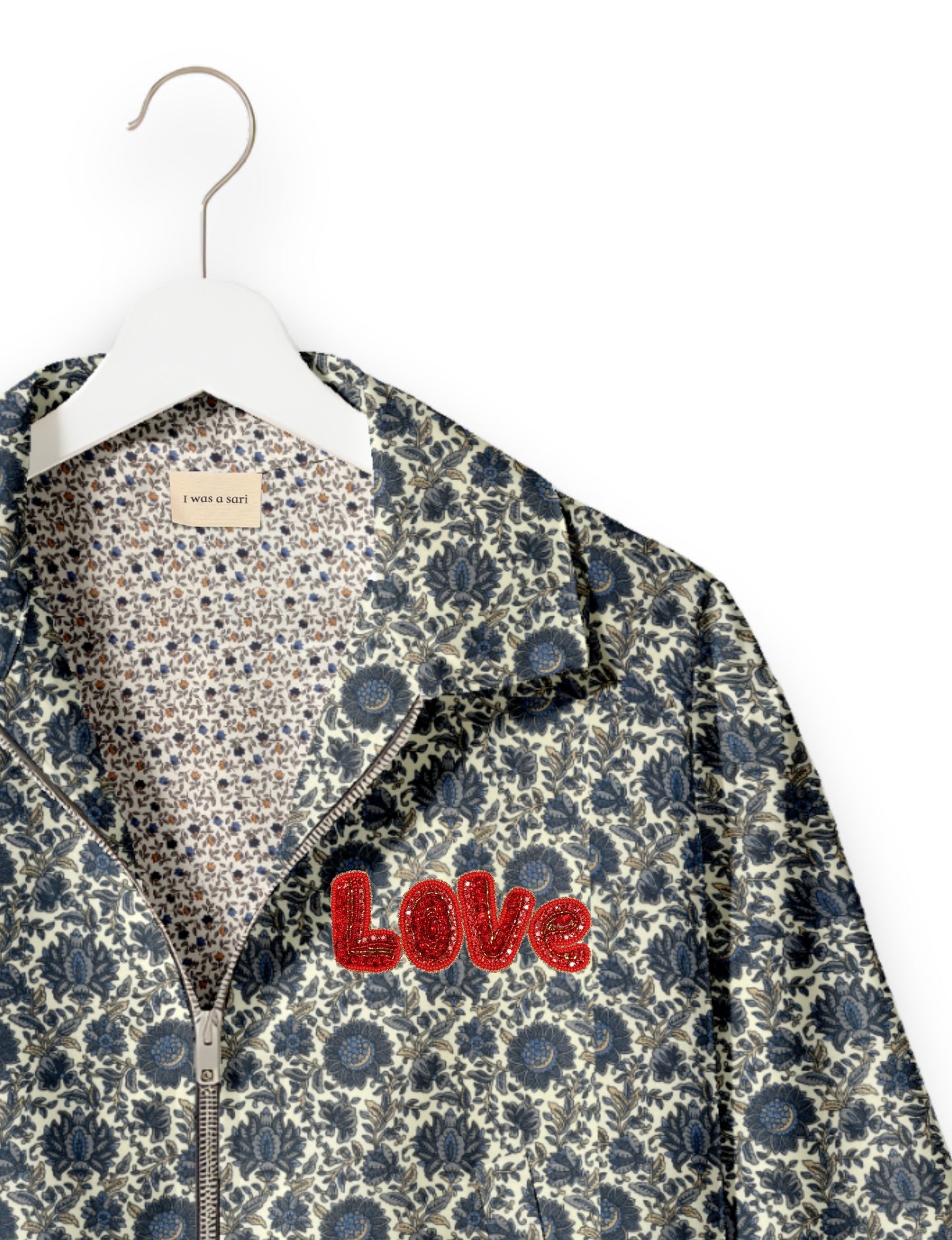 Love Bomber Jacket made from recycled fabric, featuring hand-stitched Aari embroidery. A unique piece of zero-waste clothing, part of the circular fashion movement. Designed with upcycled materials for a stylish yet environmentally friendly clothing choice.
