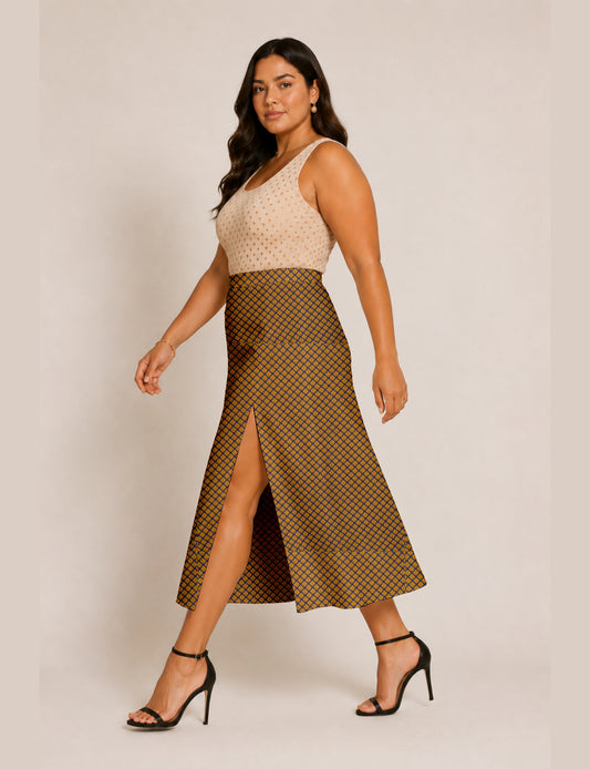 Woman wearing a yellow and black micro patterned A-line skirt with front slit, paired with beige sleeveless top and black