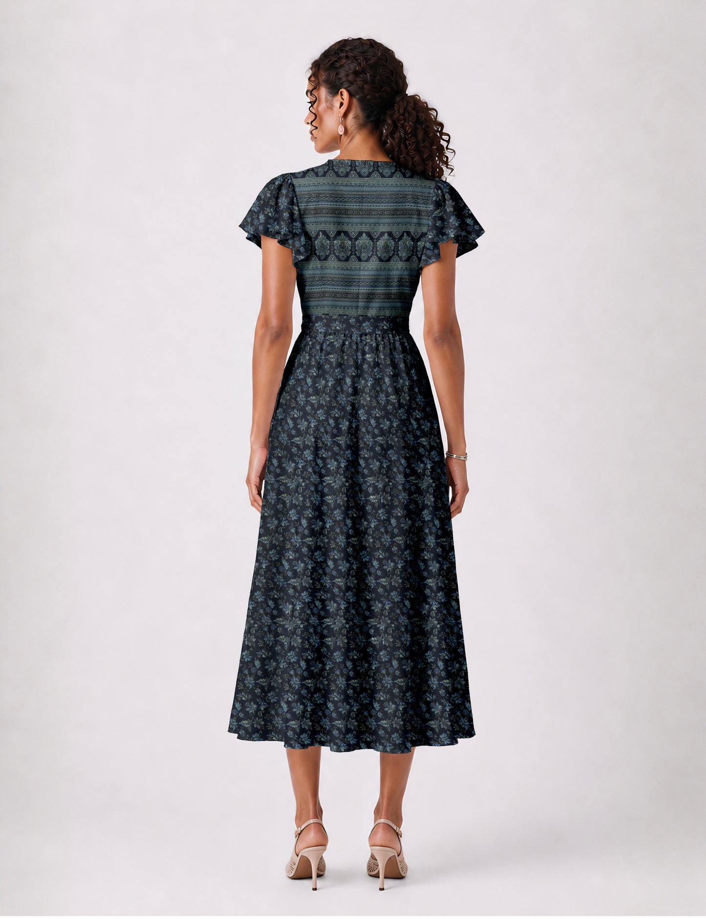 Elegant midi wrap dress with a V-neckline, adjustable waist tie, fitted bodice, and flared skirt for a timeless, flattering silhouette.