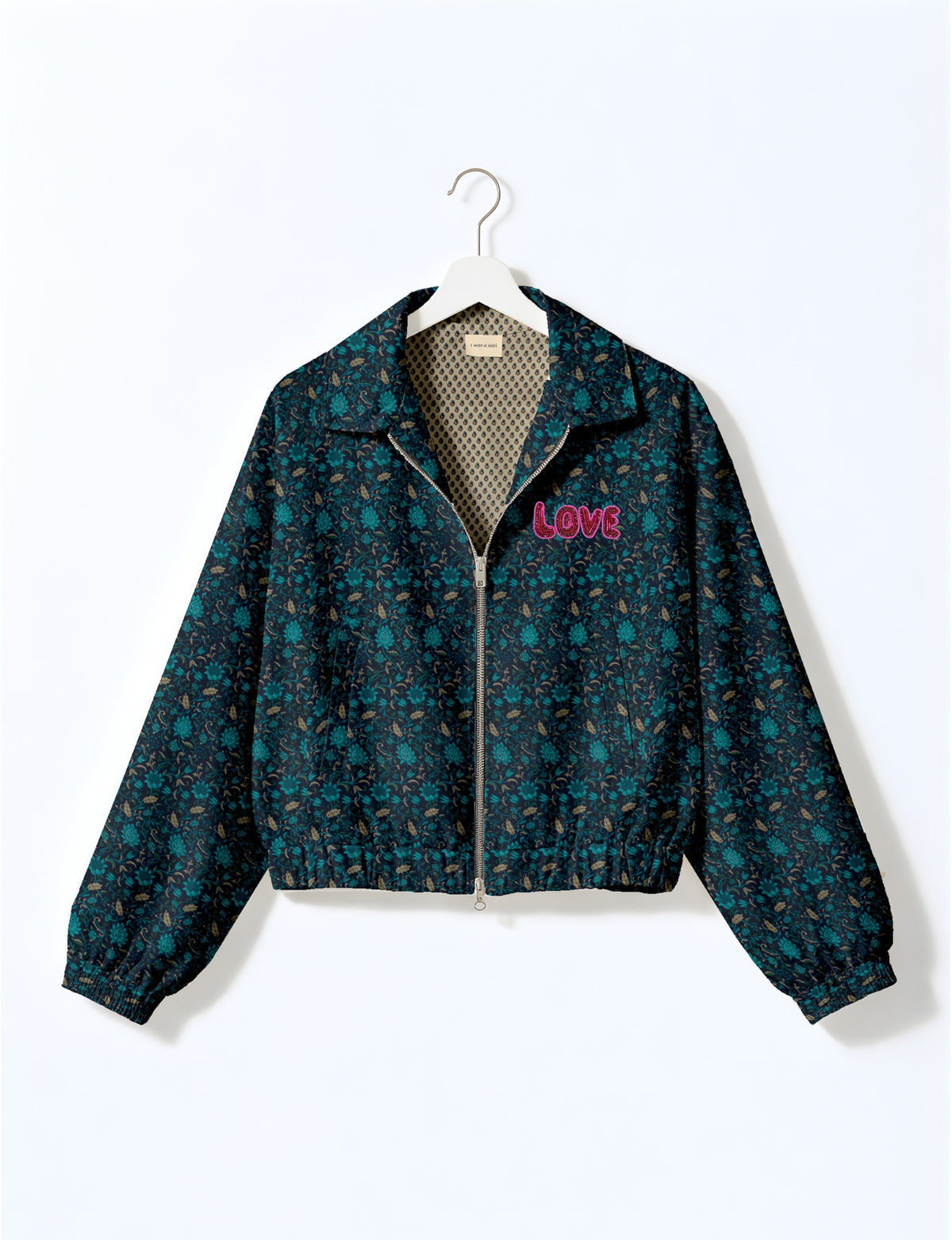 Love Bomber Jacket made from recycled fabric, featuring hand-stitched Aari embroidery. A unique piece of zero-waste clothing, part of the circular fashion movement. Designed with upcycled materials for a stylish yet environmentally friendly clothing choice.
