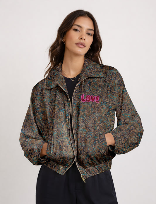 Love Bomber Jacket made from recycled fabric, featuring hand-stitched Aari embroidery. A unique piece of zero-waste clothing, part of the circular fashion movement. Designed with upcycled materials for a stylish yet environmentally friendly clothing choice.
