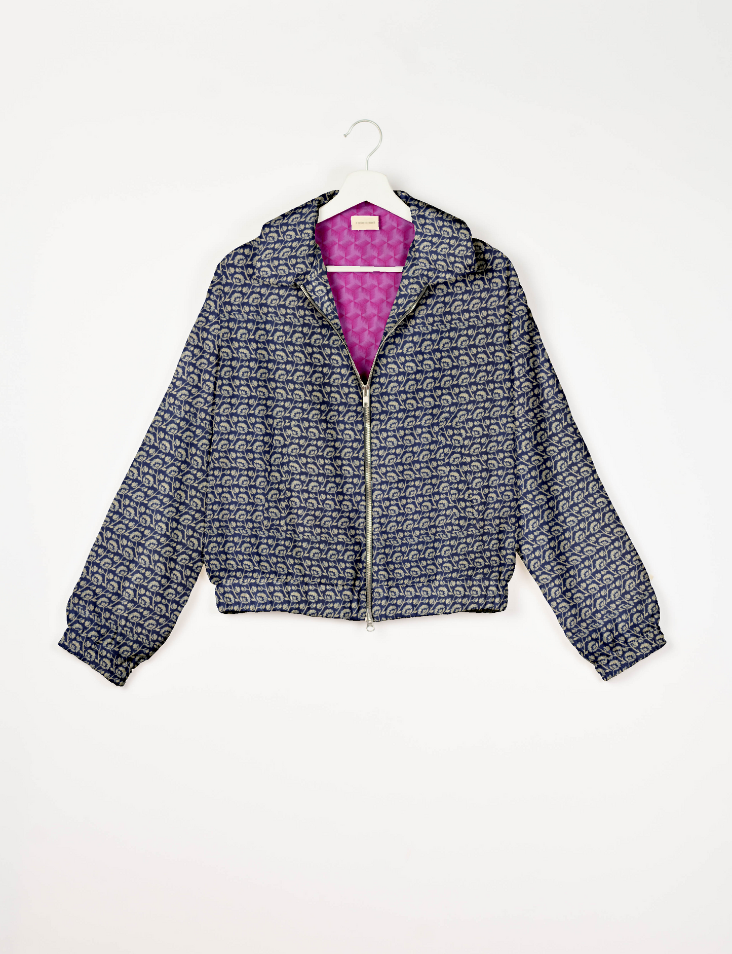 Upcycled Bomber Jacket made from recycled sari materials, featuring a cute cropped shape, elasticated hem and cuffs, and contrast sari print lining. Sustainable apparel promoting eco-friendly fashion and ethical clothing.