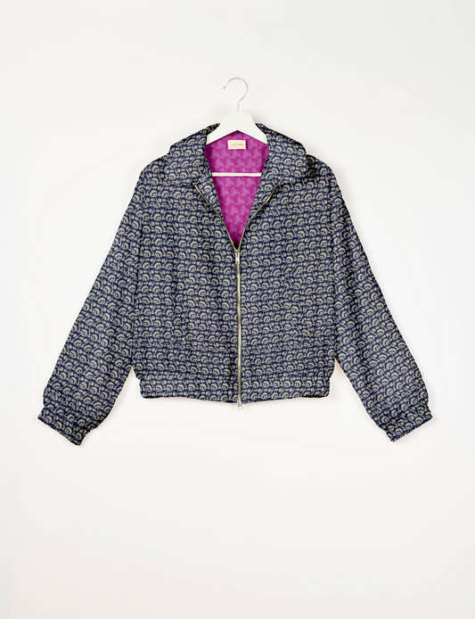 Upcycled Bomber Jacket made from recycled sari materials, featuring a cute cropped shape, elasticated hem and cuffs, and contrast sari print lining. Sustainable apparel promoting eco-friendly fashion and ethical clothing.