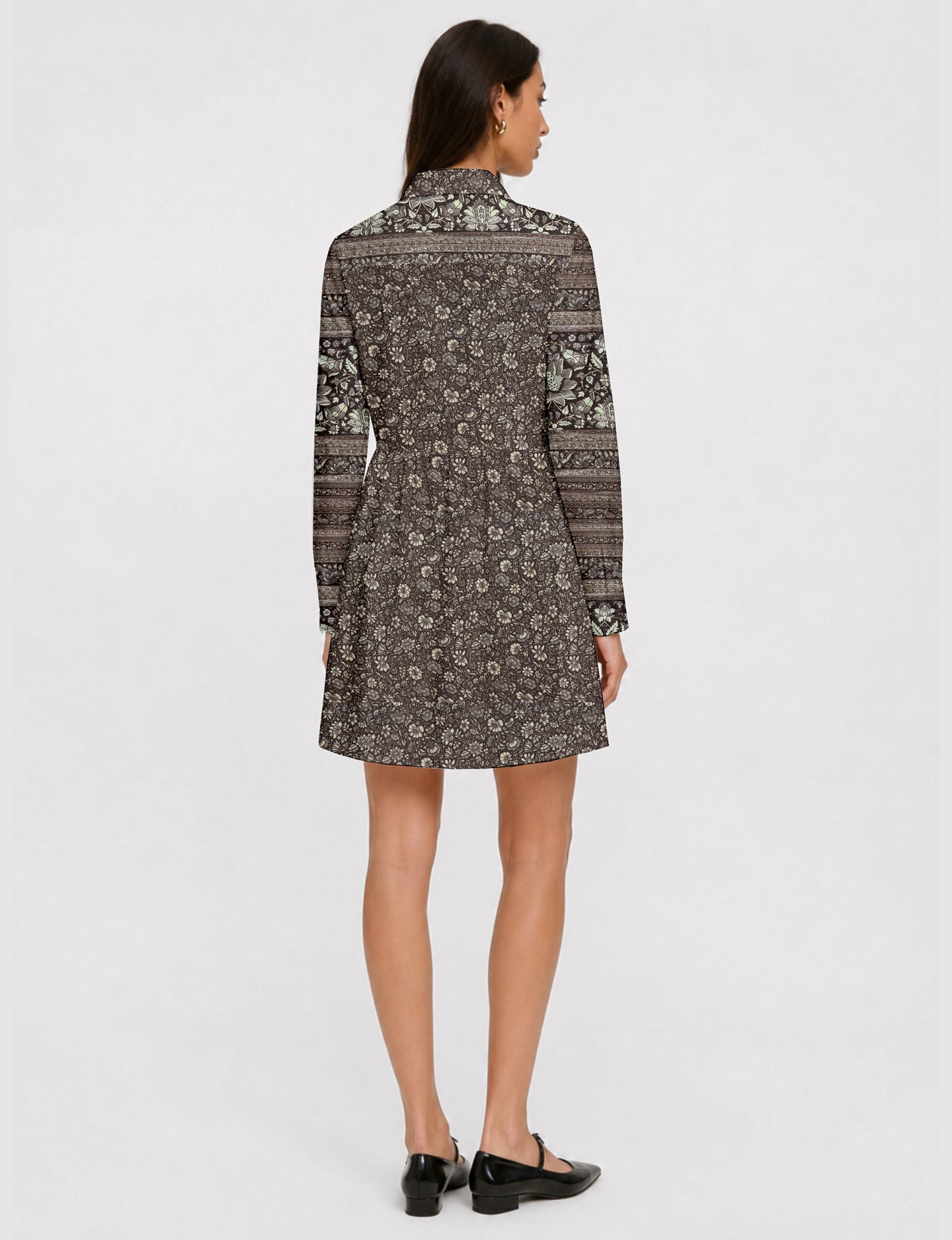 Short shirt dress with a relaxed A-line silhouette, point collar, partial button placket, gathered waist, side pockets, and full-length cuffed sleeves.