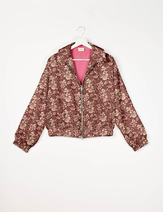 Upcycled Bomber Jacket made from recycled sari materials, featuring a cute cropped shape, elasticated hem and cuffs, and contrast sari print lining. Sustainable apparel promoting eco-friendly fashion and ethical clothing.