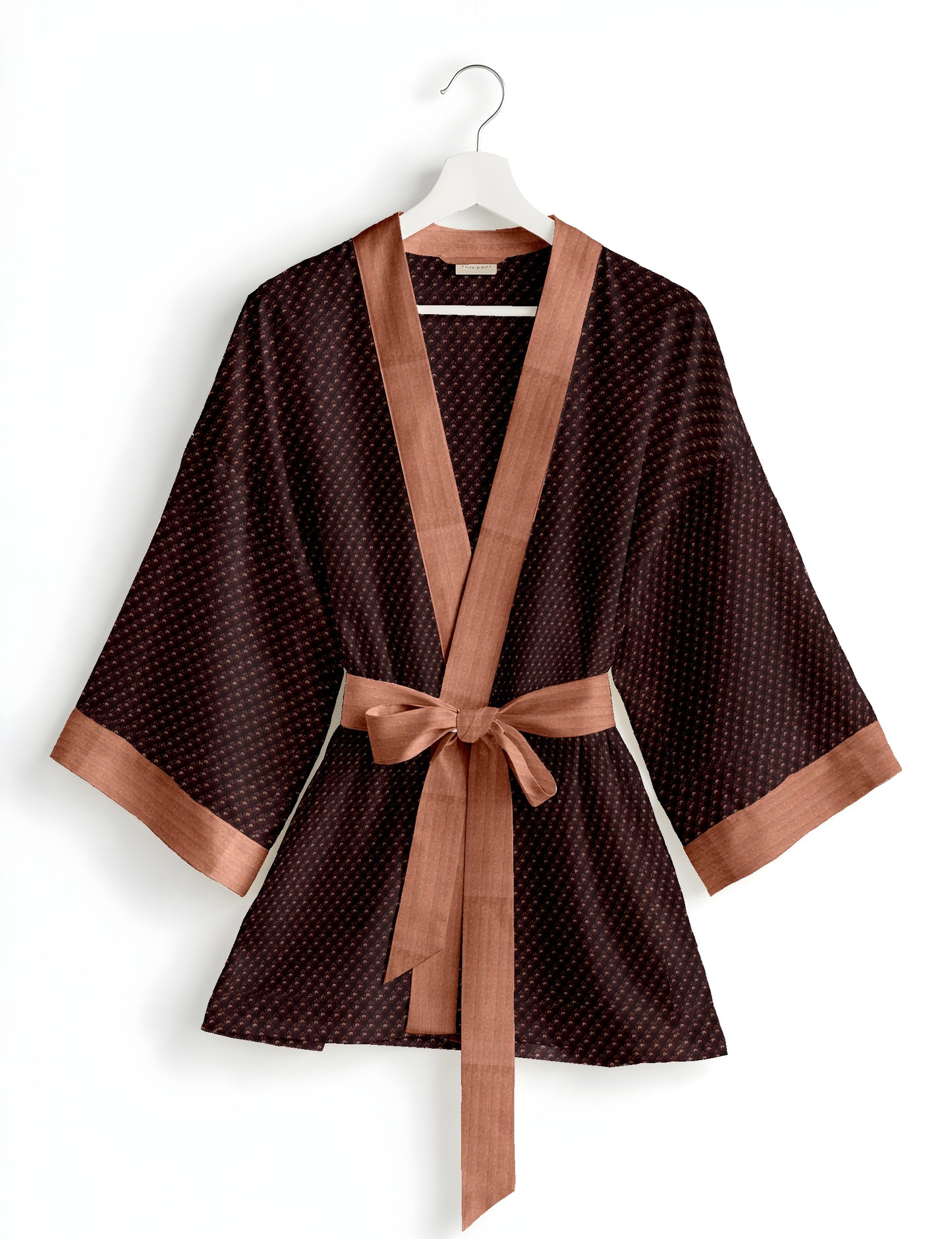 Short kimono robe with wrap front, V-neckline, wide sleeves, waist tie, and concealed skort detail.