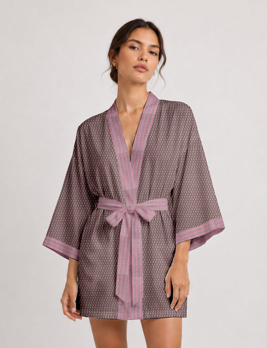 Short kimono robe with wrap front, V-neckline, wide sleeves, waist tie, and concealed skort detail.