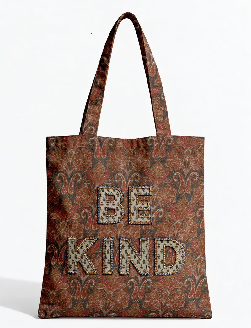 Be Kind tote bag with contrast sari fabric appliqué lettering, double shoulder straps, and front slip pocket.