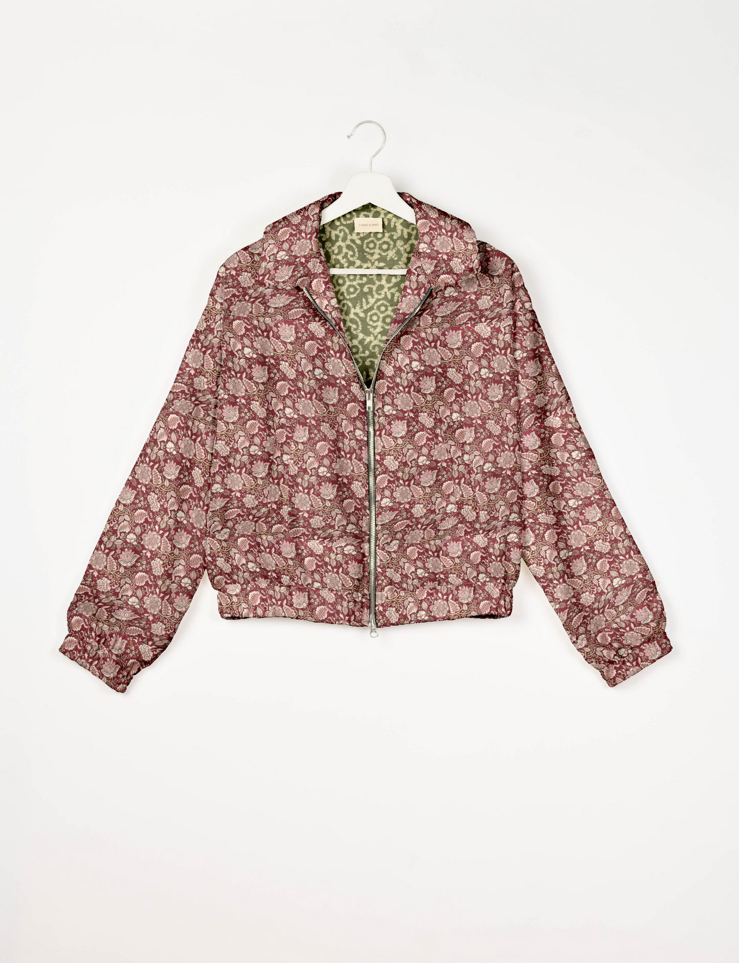 Upcycled Bomber Jacket made from recycled sari materials, featuring a cute cropped shape, elasticated hem and cuffs, and contrast sari print lining. Sustainable apparel promoting eco-friendly fashion and ethical clothing.