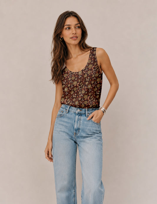 Women's sleeveless blouse with a relaxed straight fit, wide scoop neckline, deep scoop back, and hip-length silhouette.