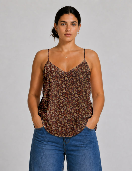 Women's sleeveless slip top with a relaxed straight fit, soft V-neckline, deep V-back, and delicate spaghetti straps.