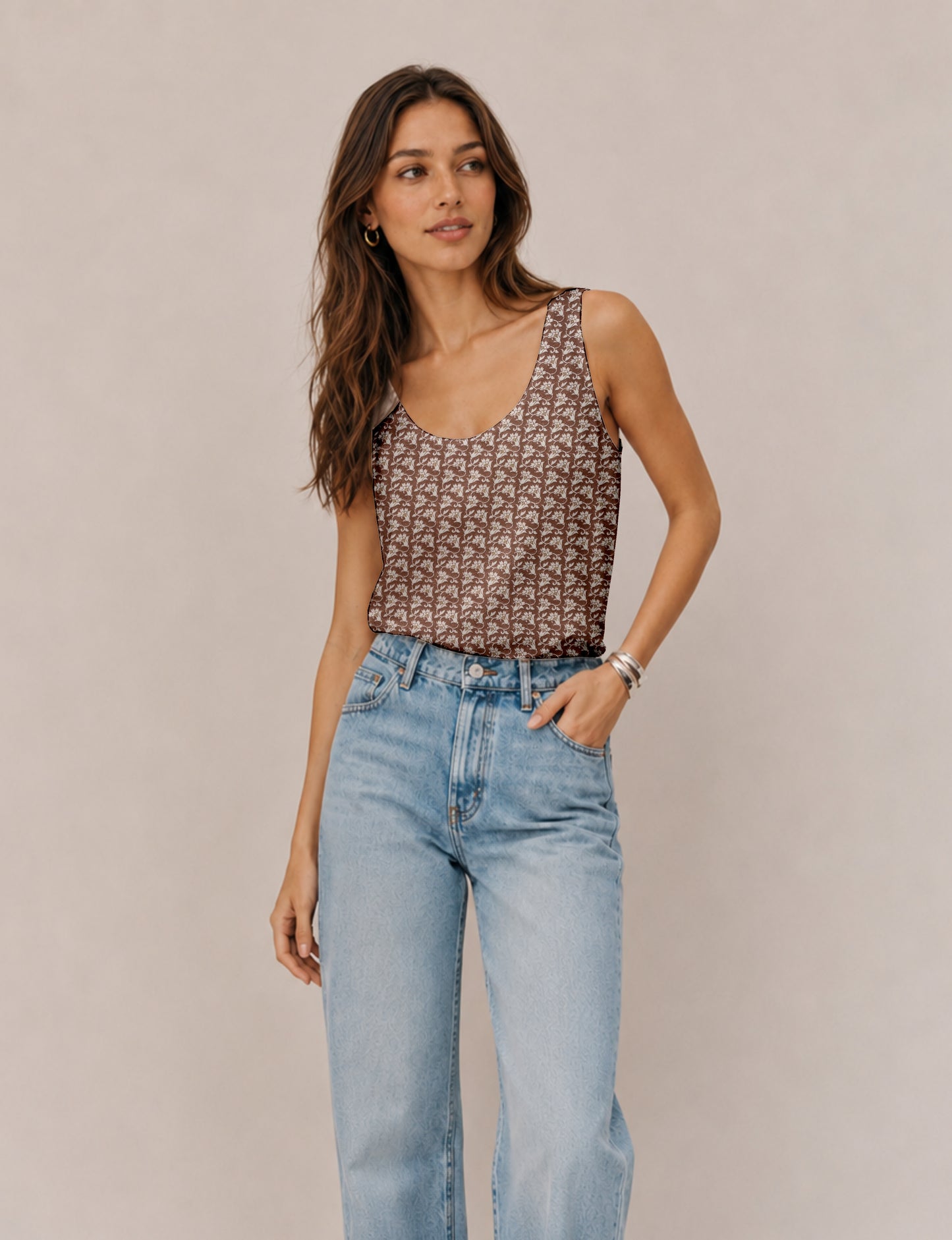 Women's sleeveless blouse with a relaxed straight fit, wide scoop neckline, deep scoop back, and hip-length silhouette.