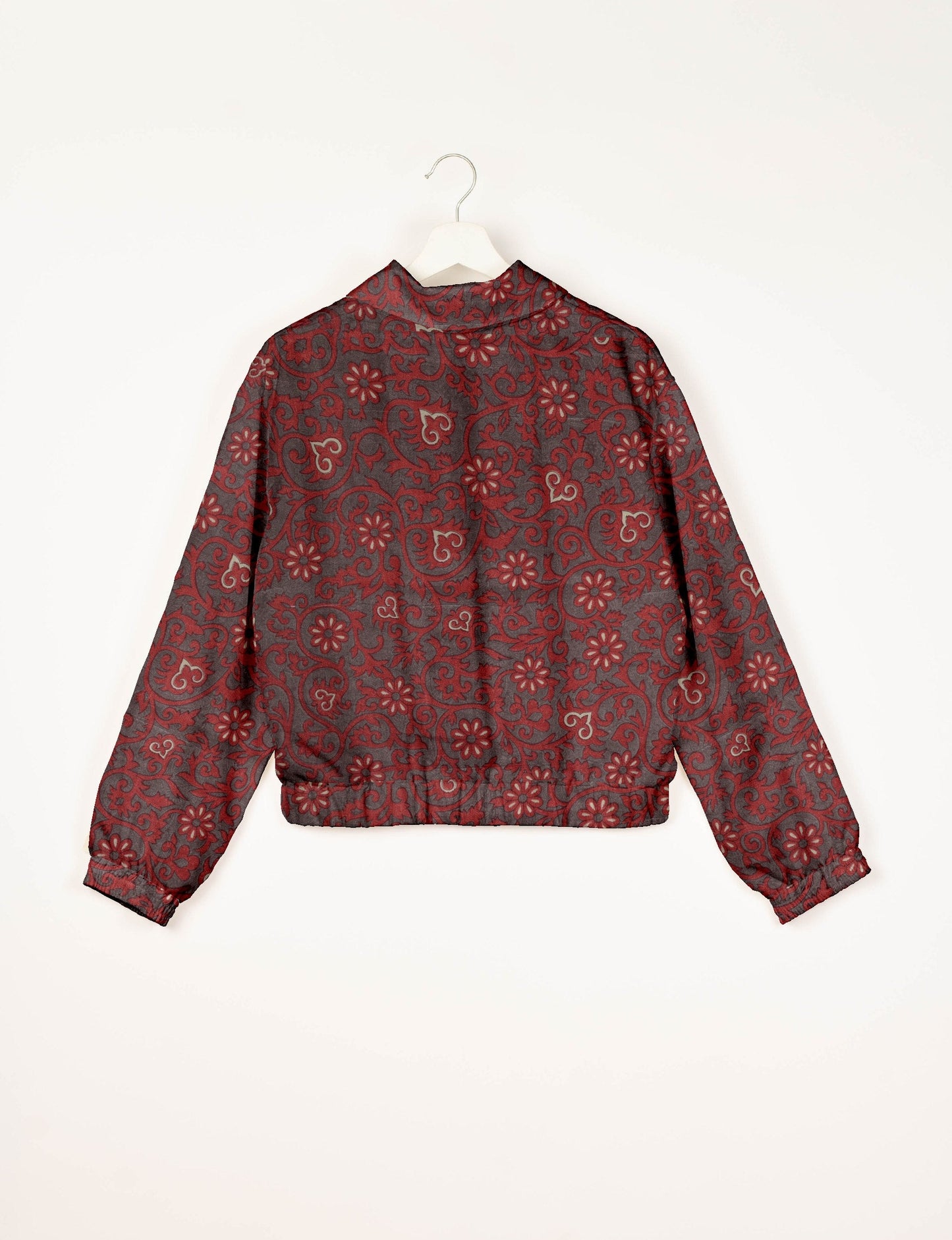 Upcycled Bomber Jacket made from recycled sari materials, featuring a cute cropped shape, elasticated hem and cuffs, and contrast sari print lining. Sustainable apparel promoting eco-friendly fashion and ethical clothing.