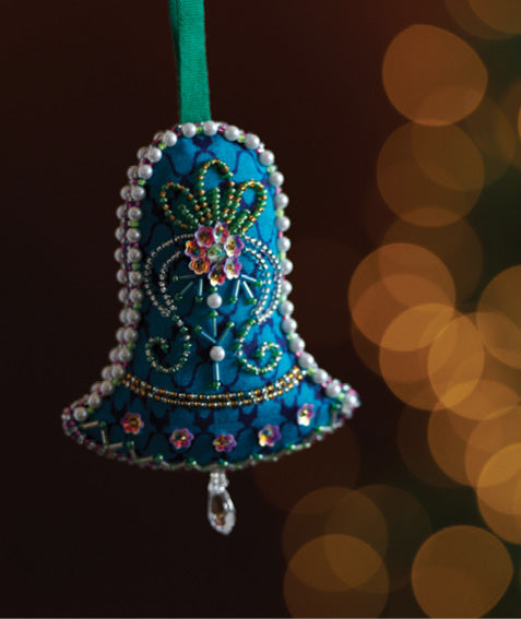 Blue bell-shaped ornament with green, pink, and white bead embellishments hanging from a green ribbon