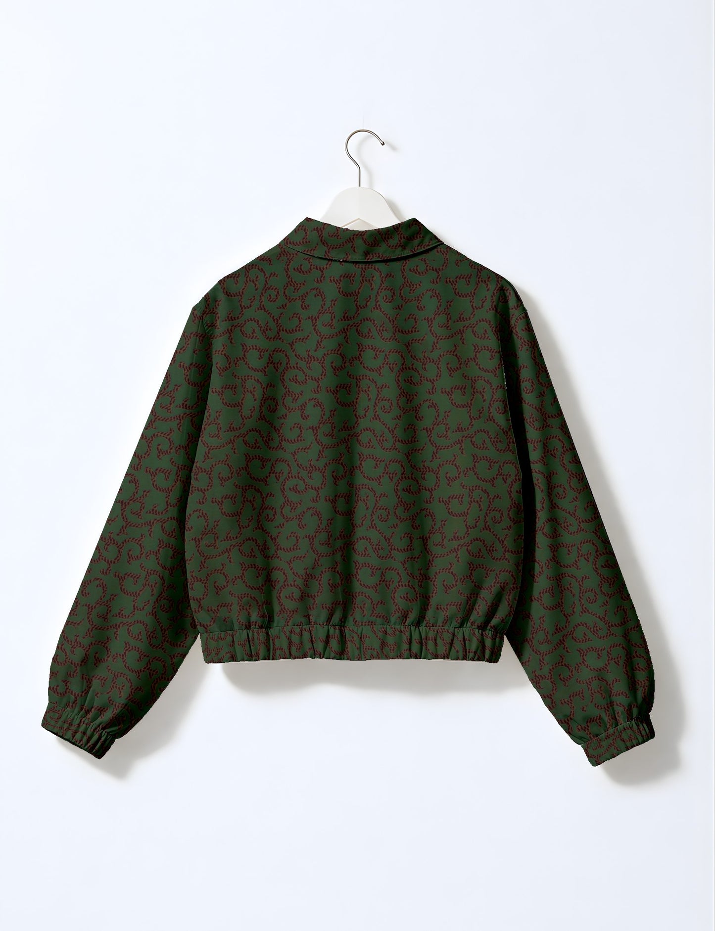 Upcycled Bomber Jacket made from recycled sari materials, featuring a cute cropped shape, elasticated hem and cuffs, and contrast sari print lining. Sustainable apparel promoting eco-friendly fashion and ethical clothing.