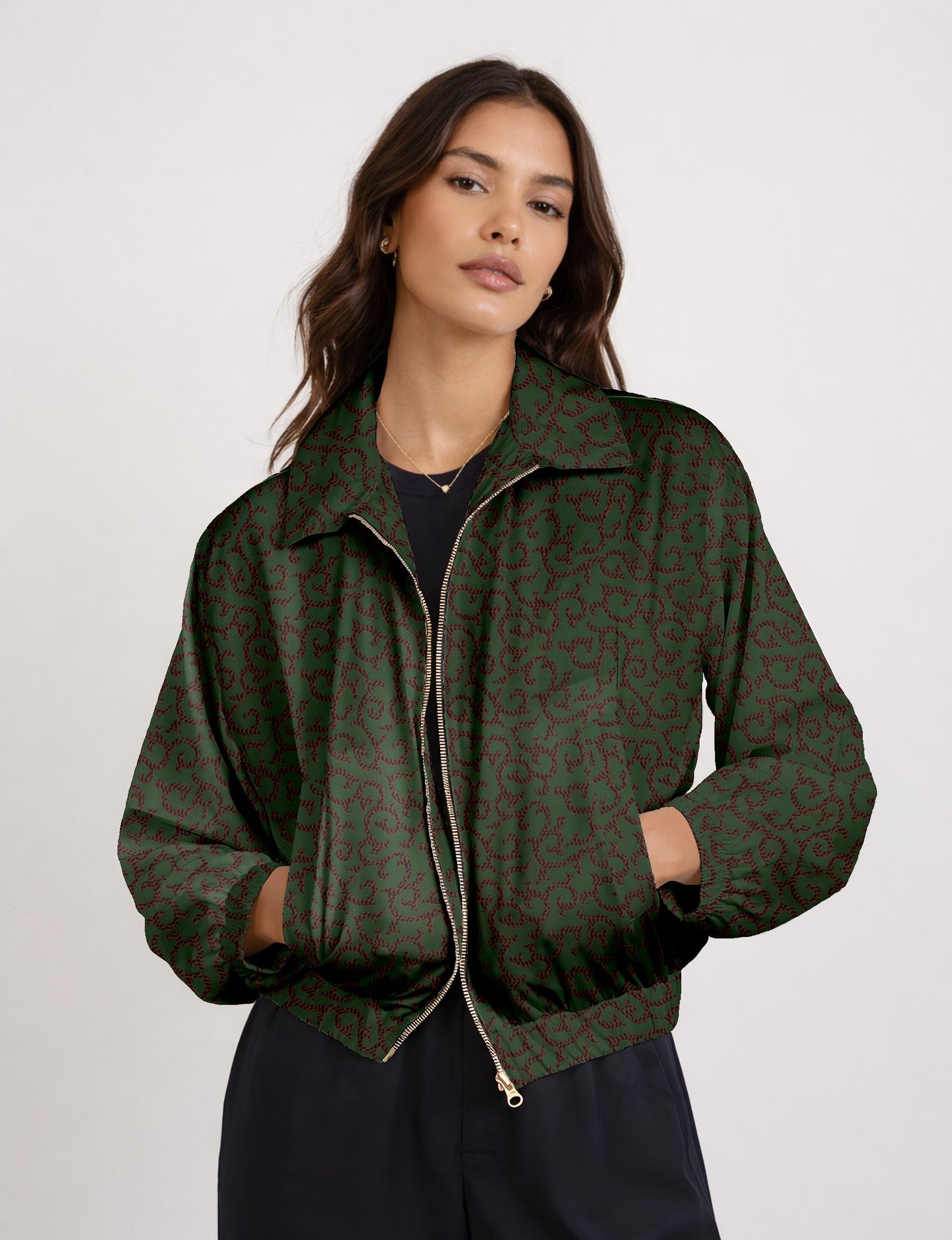 Upcycled Bomber Jacket made from recycled sari materials, featuring a cute cropped shape, elasticated hem and cuffs, and contrast sari print lining. Sustainable apparel promoting eco-friendly fashion and ethical clothing.