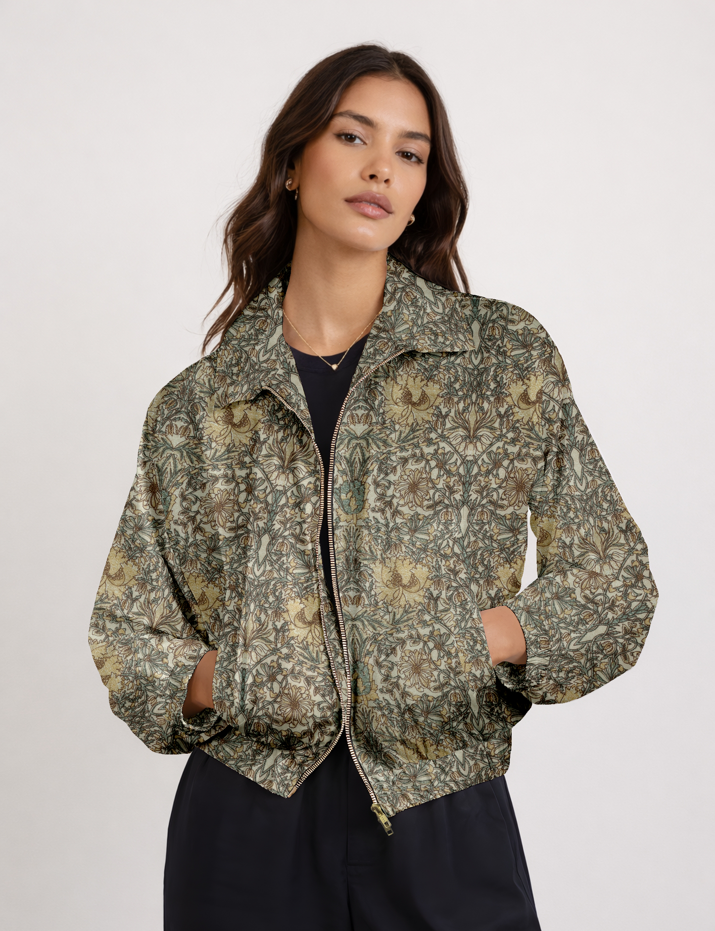 Upcycled Bomber Jacket made from recycled sari materials, featuring a cute cropped shape, elasticated hem and cuffs, and contrast sari print lining. Sustainable apparel promoting eco-friendly fashion and ethical clothing.