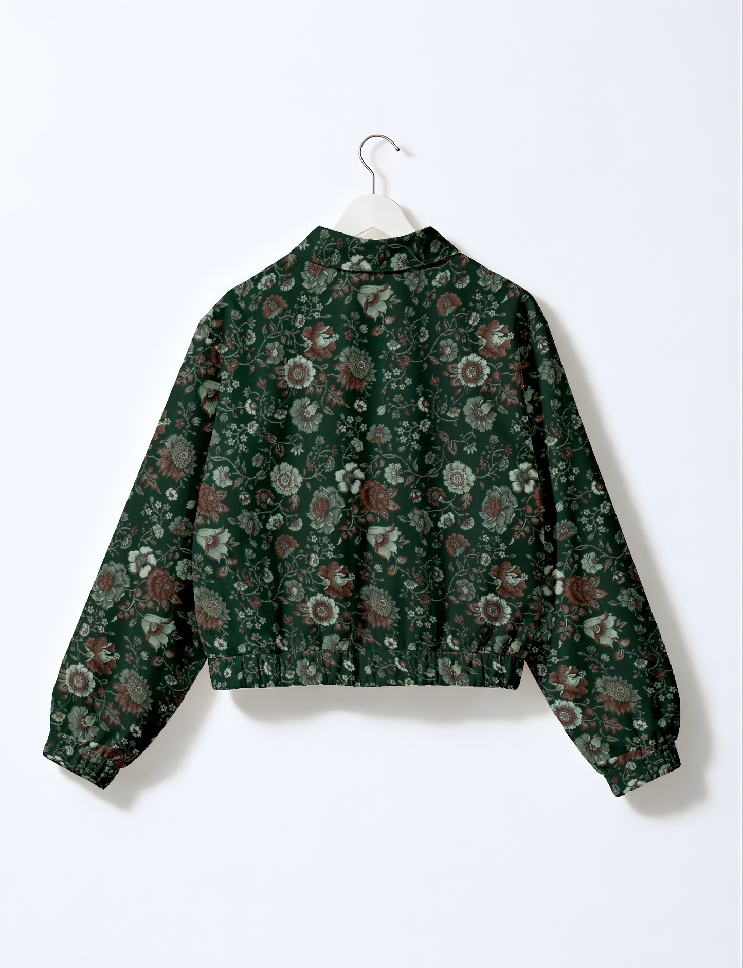 Upcycled Bomber Jacket made from recycled sari materials, featuring a cute cropped shape, elasticated hem and cuffs, and contrast sari print lining. Sustainable apparel promoting eco-friendly fashion and ethical clothing.